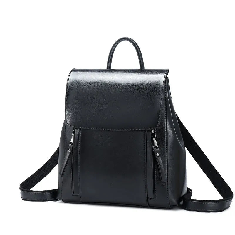 Large genuine leather women's backpack in black with stitching detail and dual straps.