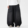 Men's plus-size light blue baggy jeans with a straight leg and zip fly