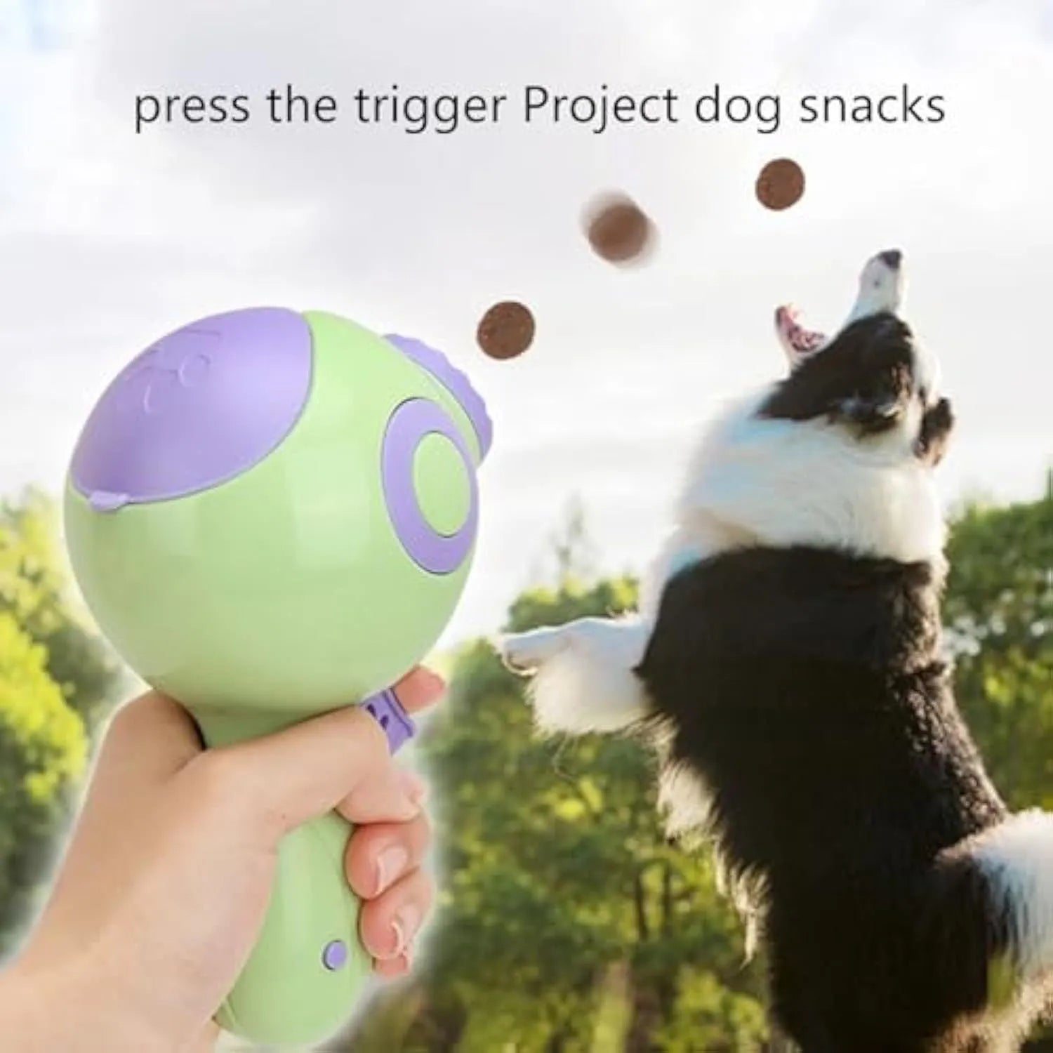 Green dog treat launcher toy measuring 15.5 cm long for interactive play and treat dispensing
