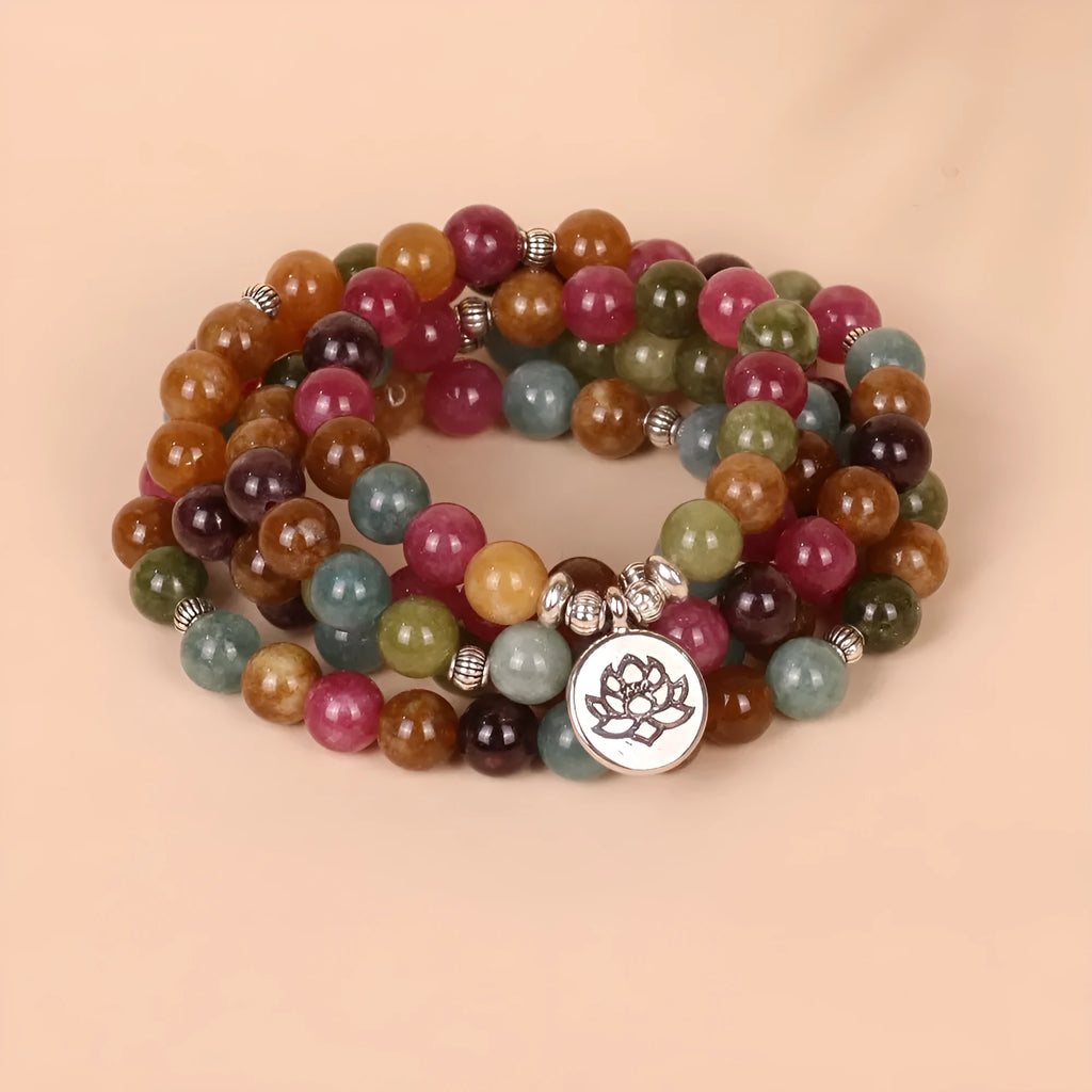 Tourmaline colour alloy bracelet with 108 beads in multi-layer hanging design featuring lotus pattern