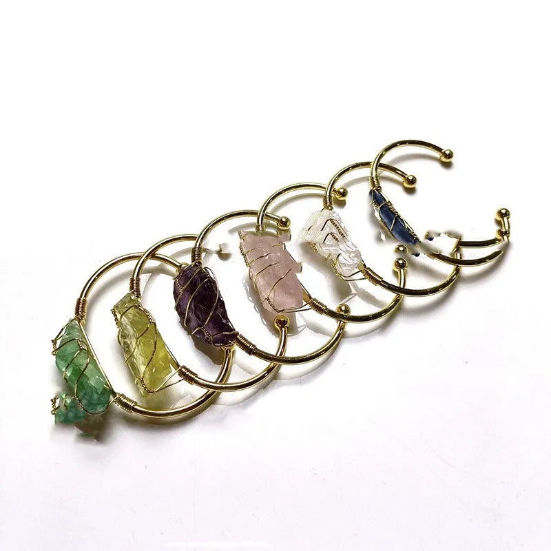 Unshaped natural crystal bracelet with gold winding wire geometric design