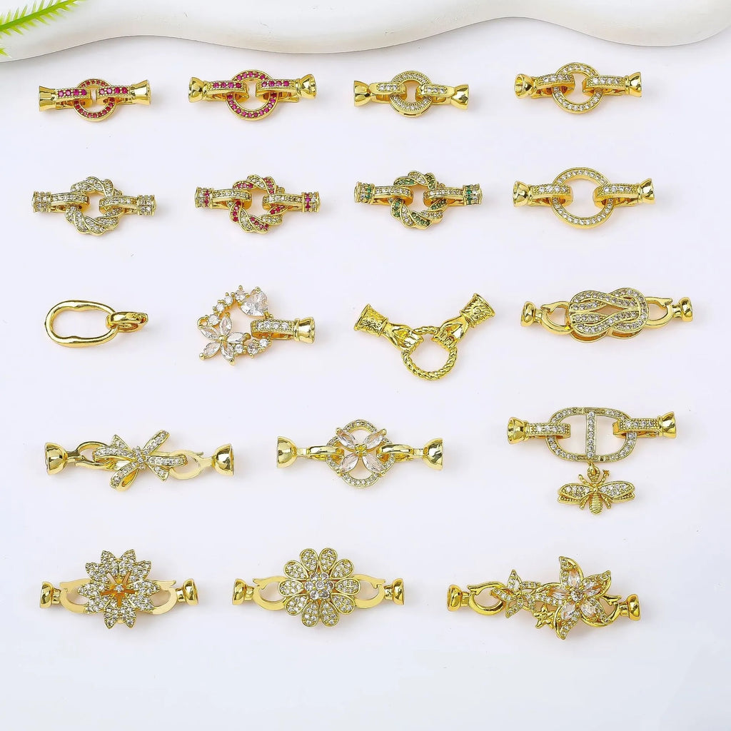 Small gold colour metal chain buckle for DIY necklace making on a white background.