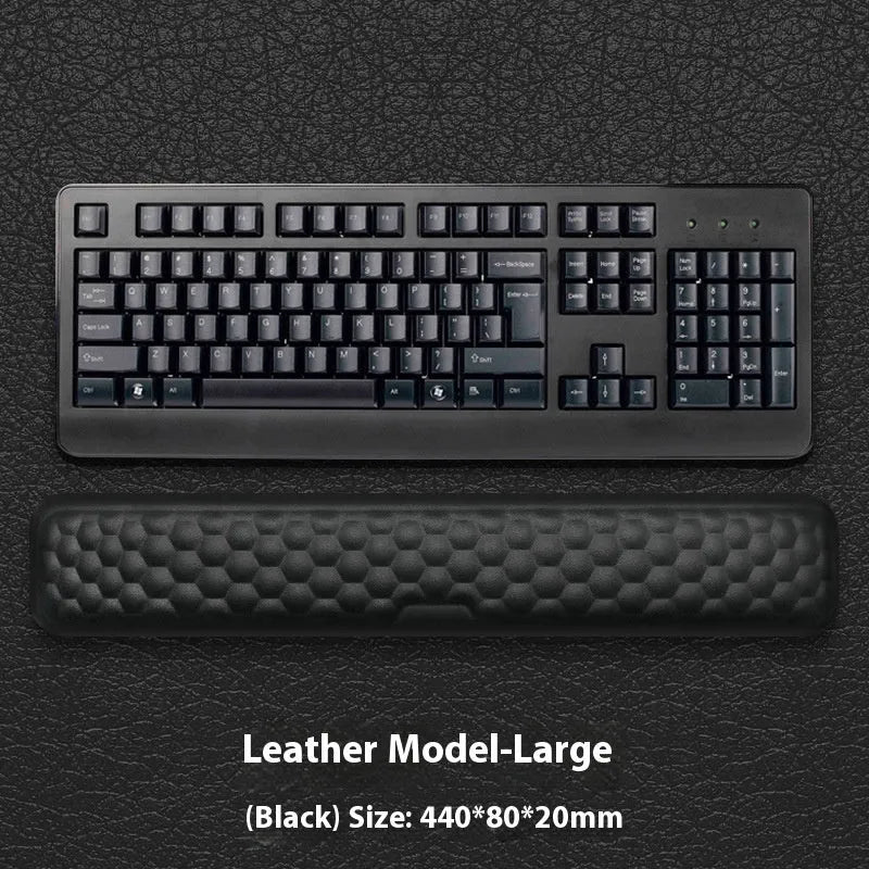 Memory foam mouse wrist rest pad with silicone base in black cloth cover option on desk