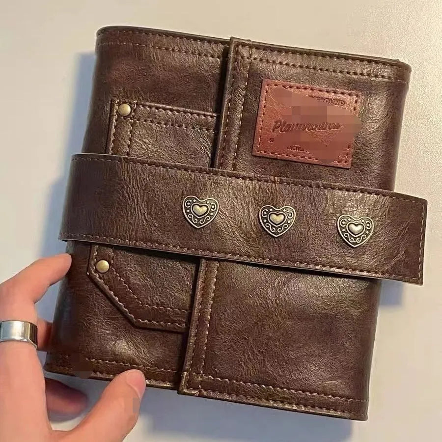 Brown retro leather buckle notebook with loose-leaf binder binding and A7 size format