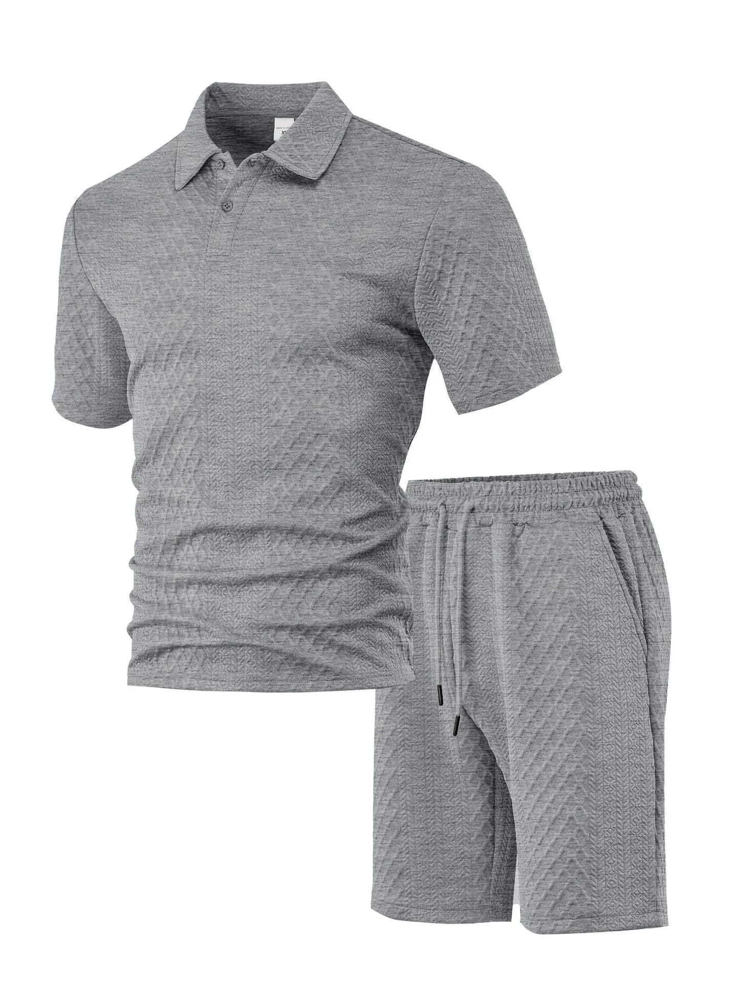 Men's patterned cloth casual suit set featuring a short sleeve polo shirt and trousers on a hanger.