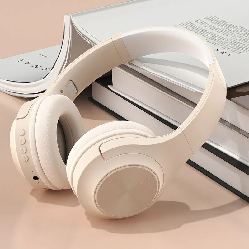 Creative design wireless Bluetooth headphones with charging case in ivory white, chalk black, and youth green colour options