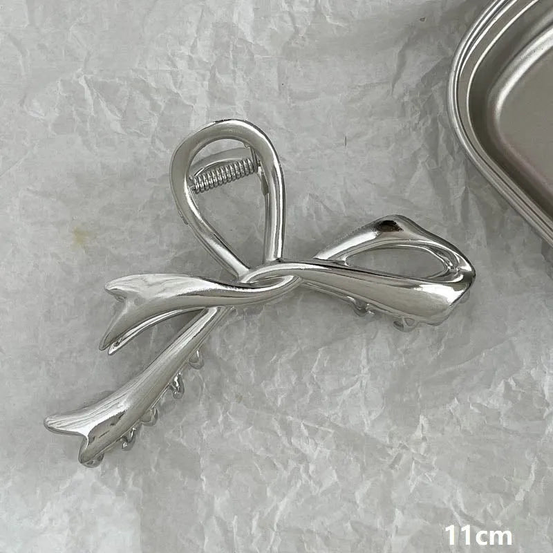 Silver metal hair barrette claw clip with electroplated finish and decorative design