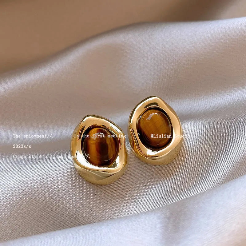 Three pairs of handmade geometric holiday earrings with electroplated alloy and tassel decorations