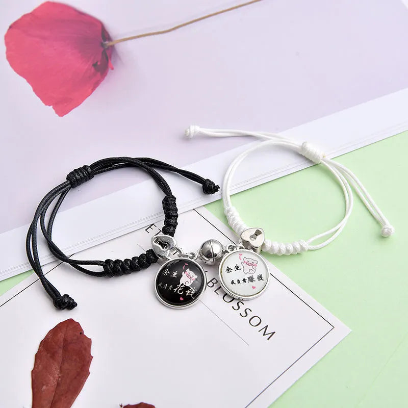 Magnetic couple bracelet pair with alloy electroplating in various designs including clover and crown patterns