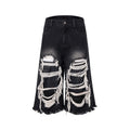 Black women's cropped wide leg jeans with mid-high waist and ripped patch detail