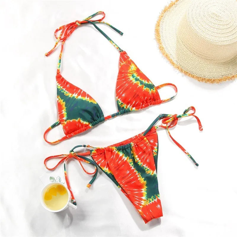 Women's polka dot print bikini swimsuit with split style design in multiple colour variations