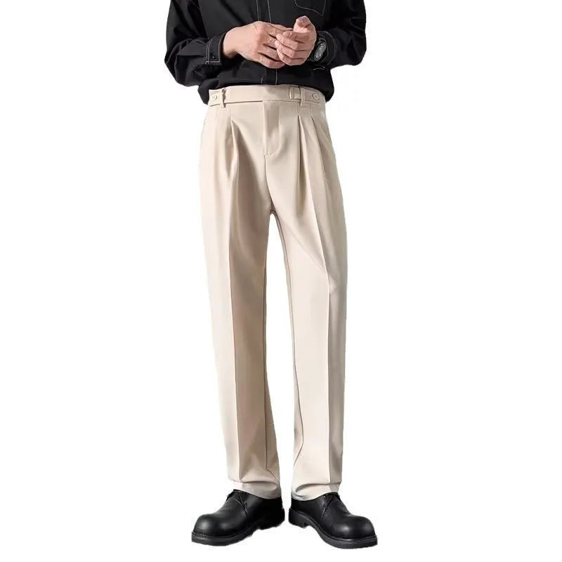 Men's straight-leg loose fit suit trousers in apricot colour on a hanger.