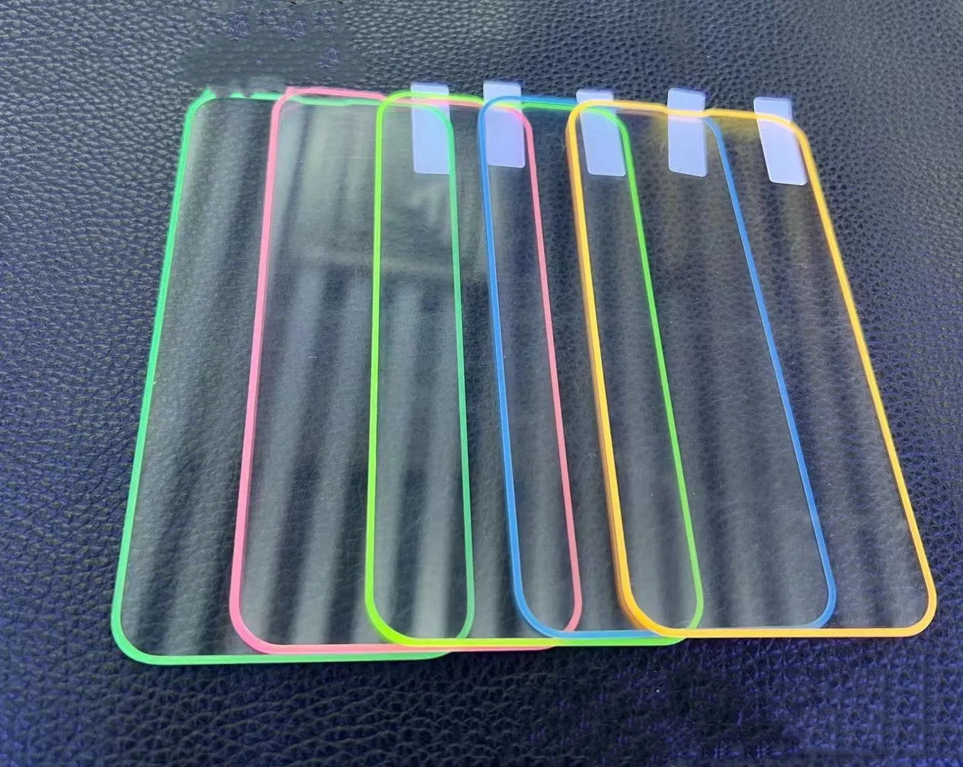 Fluorescent tempered glass screen protector for iPhone with luminous blue edges