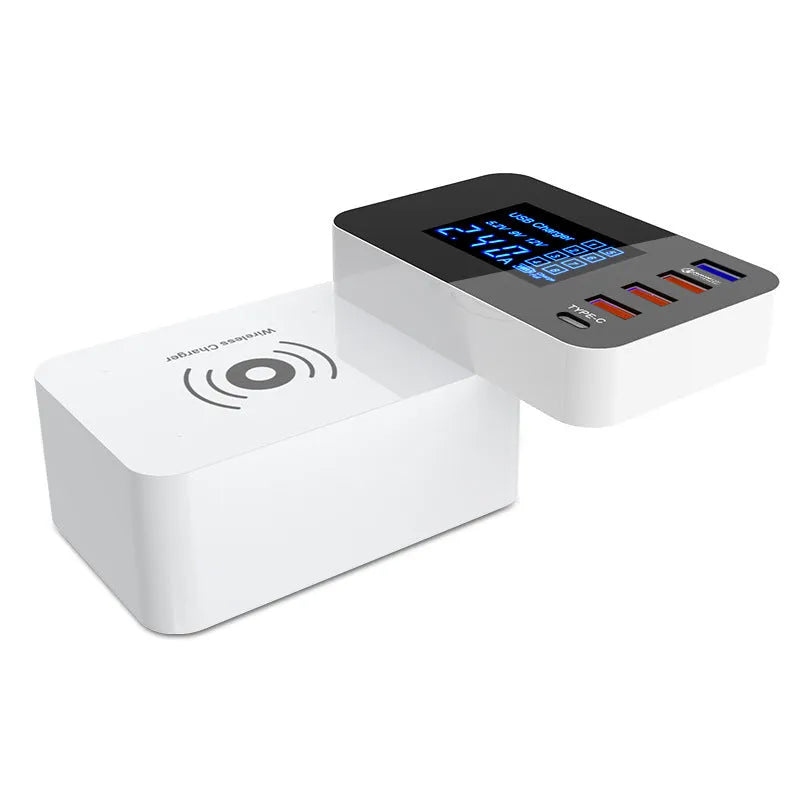 White multi USB port fast charger with wireless charging pad on top, showing four USB ports and UK plug adapter