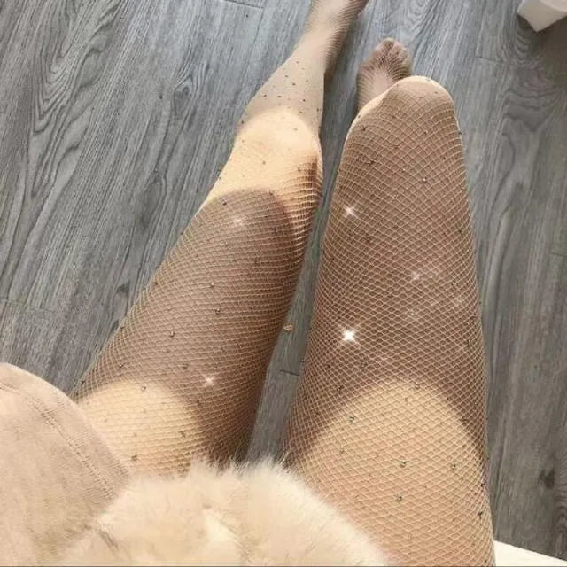 Thin nylon mesh women's fishnet stockings with diamond pattern in skin tone, black, or white.