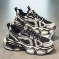 Men's black mesh sneakers with a platform sole and lace-up front on a white background.