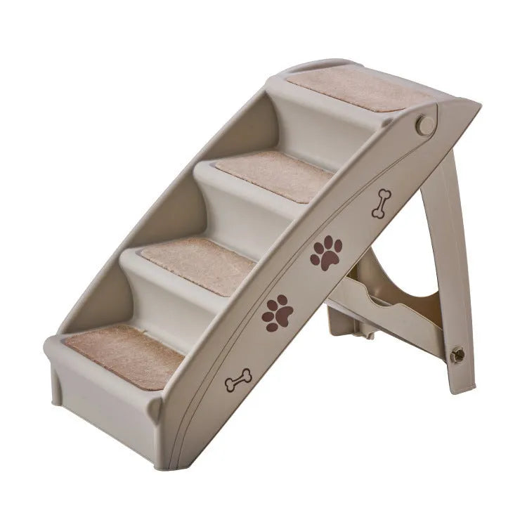 Foldable plastic pet step ladder in beige colour with non-slip mat, placed next to a sofa.