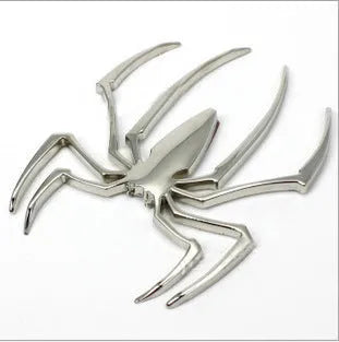 Three-dimensional metal spider bumper sticker in zinc alloy, showing detailed design