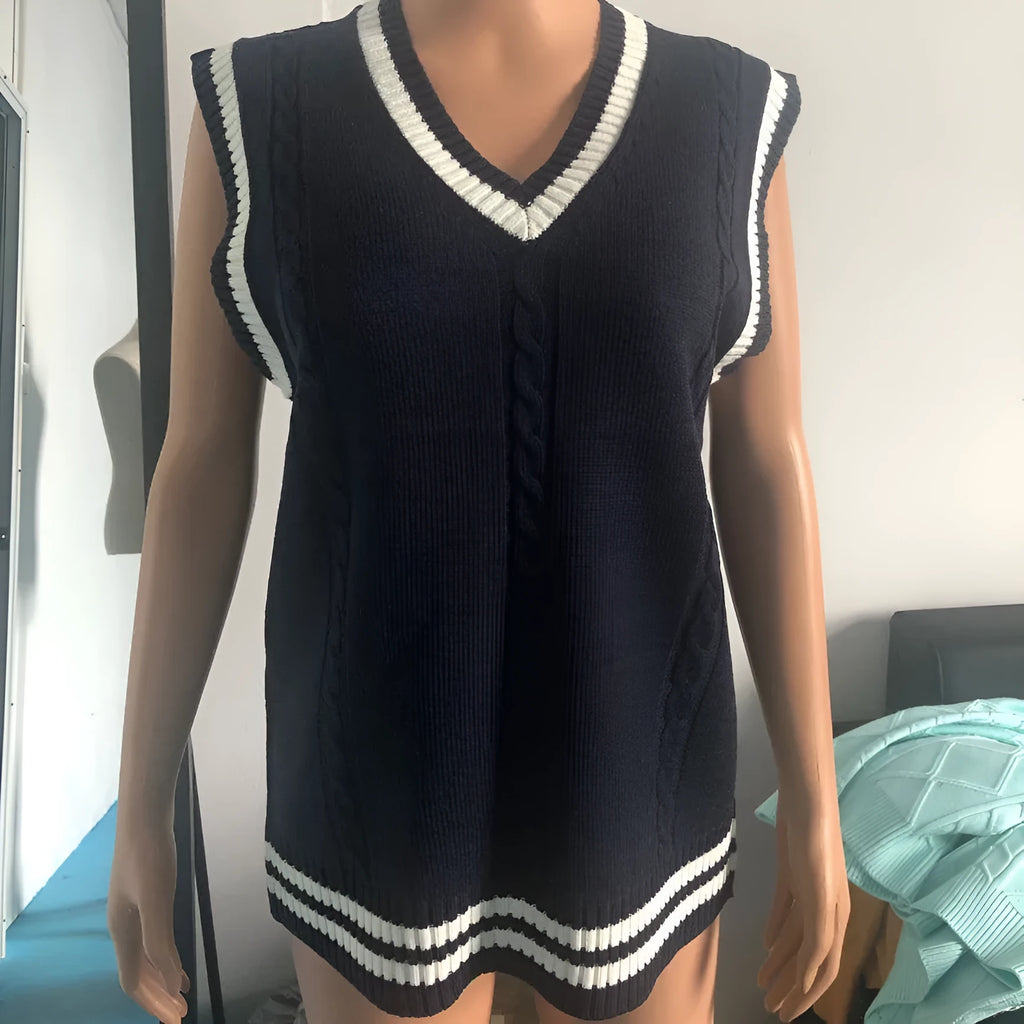 Women's slim fit black acrylic V-neck waistcoat sweater with white striped stitching detail.