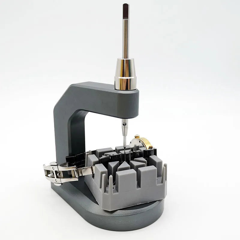 Silver multi-purpose press strap removal tool made from tool steel for watches, jewellery, and electronics.