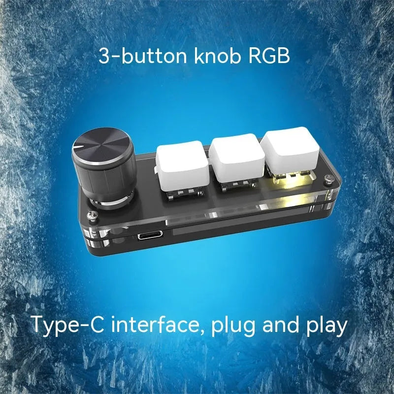Black custom keypad with RGB backlit keys for copy and paste functions on a desk