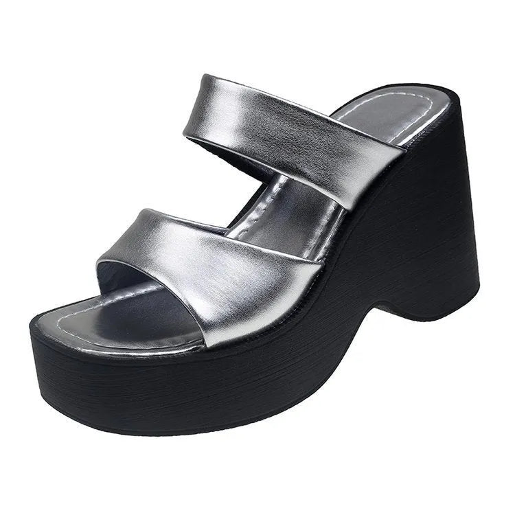 Women's black wedge platform slippers with square toe and PU upper.