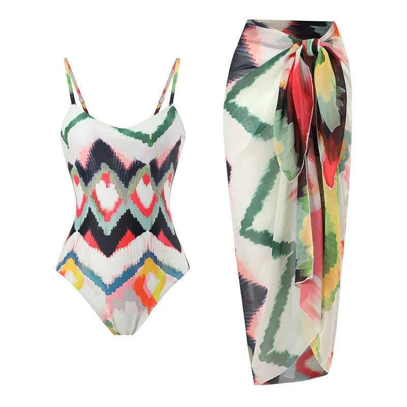 Women's two-piece striped swimsuit with matching hip skirt on beach