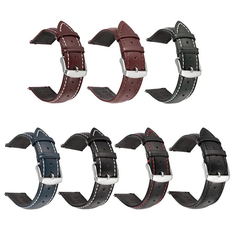 Quick-release cowhide leather watch strap in black with white accent line, showing the spring bar mechanism.