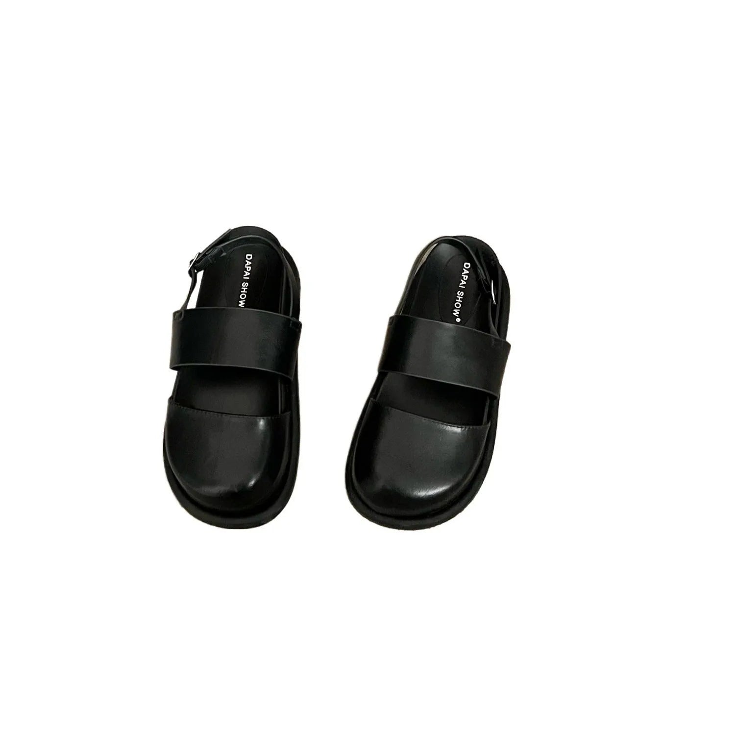 Retro style closed toe sandals with a single ankle buckle strap in apricot colour.