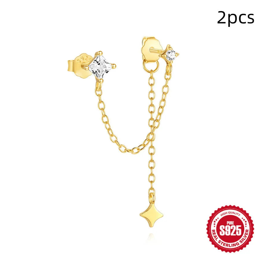 Golden geometric sterling silver earrings with zircon details for double piercings