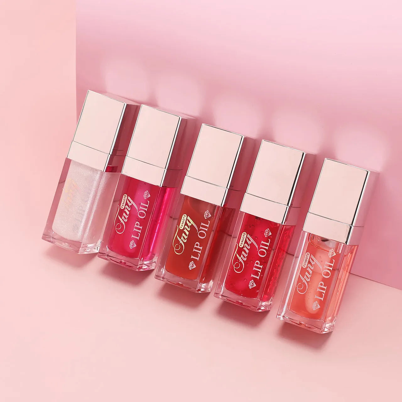 Bright mint lip gloss tube with five colour options showing moisturising and repairing lipstick