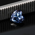 Lemon yellow heart-shaped moissanite stone measuring 5mm by 5mm