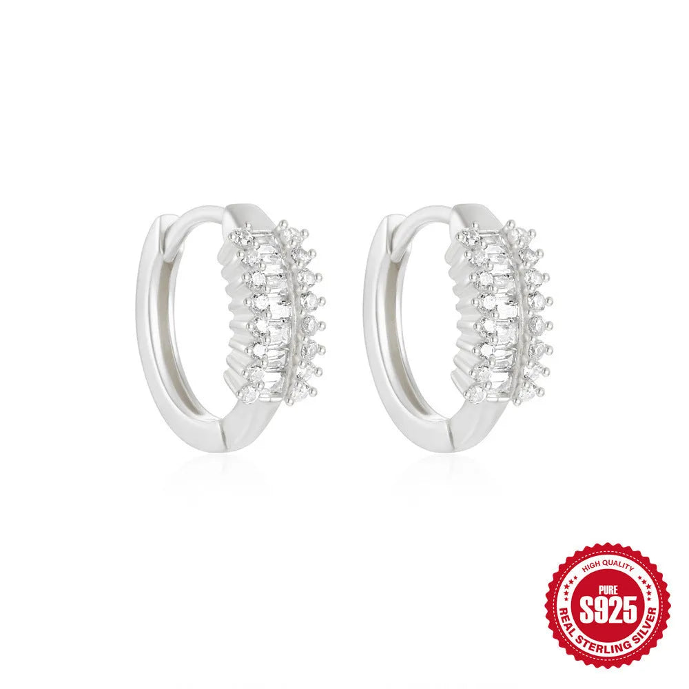 Sterling silver geometric stud earrings with small round diamond accents in gold or silver electroplated finish