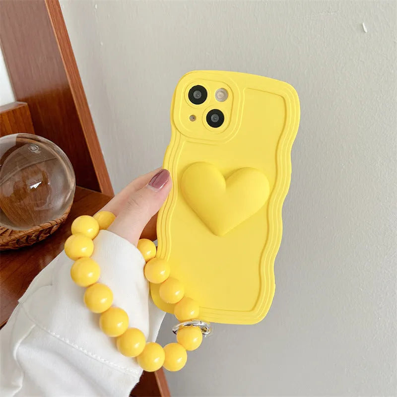 Silicone wavy edge phone case with love ball chain in Rose Red for iPhone 14 Pro Max