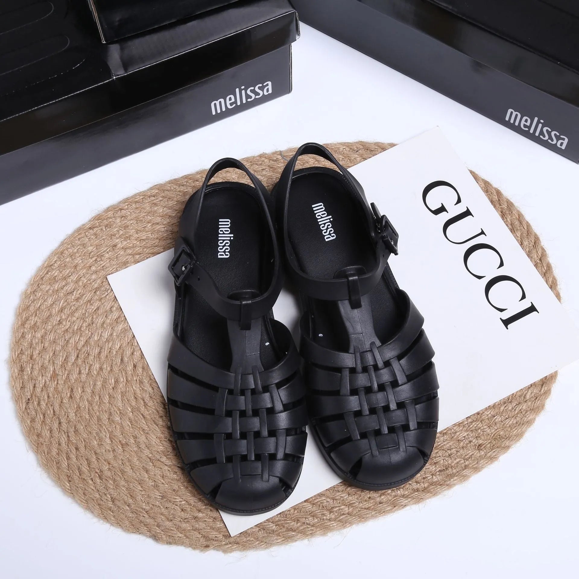 Vintage weave Roman sandals in black with buckle fastening and hollow out design elements
