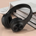 Creative design wireless Bluetooth headphones with charging case in ivory white, chalk black, and youth green colour options