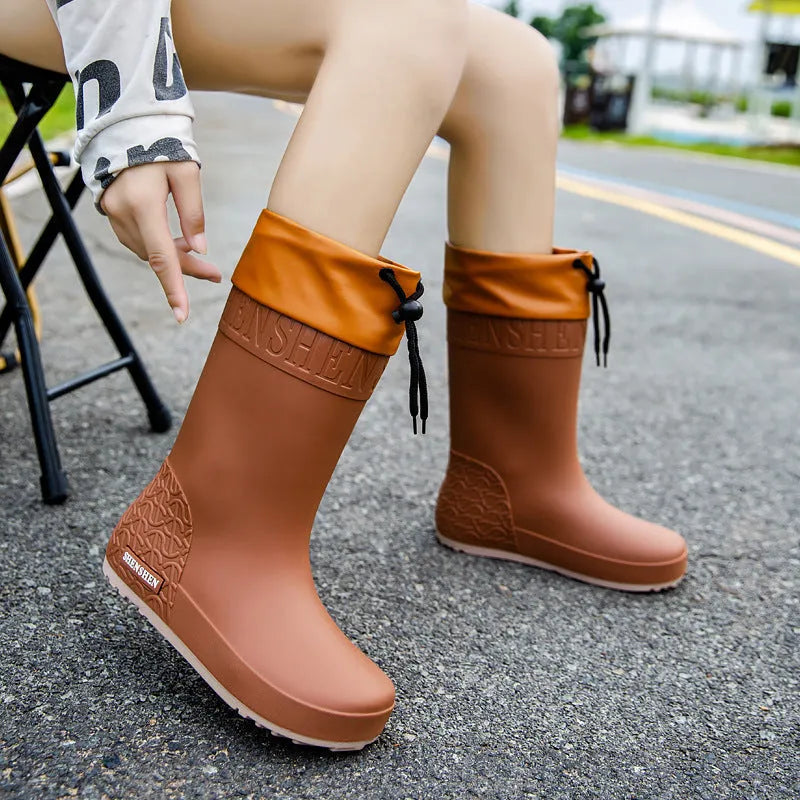 Women's PVC rain boots in apricot, black, brown and pink colours with non-slip wear-resistant construction