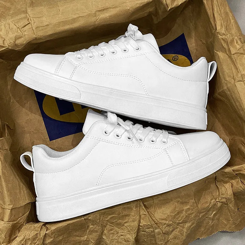 Men's Korean-style low-top sneakers in white, black, or two-tone colour with flat rubber sole