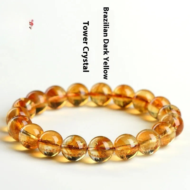 Natural yellow citrine gemstone bracelet showing single circle and three circle bead designs on a wrist.