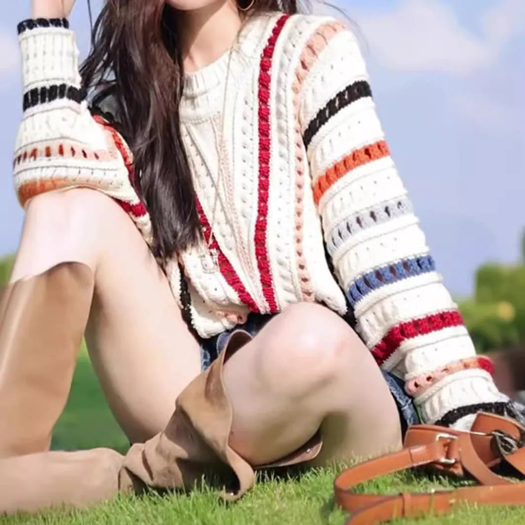 Rainbow striped pullover sweater with batwing sleeves and round neck in loose fit casual style