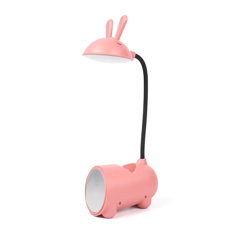 Cartoon-style USB table lamp with pen storage compartment in green colour