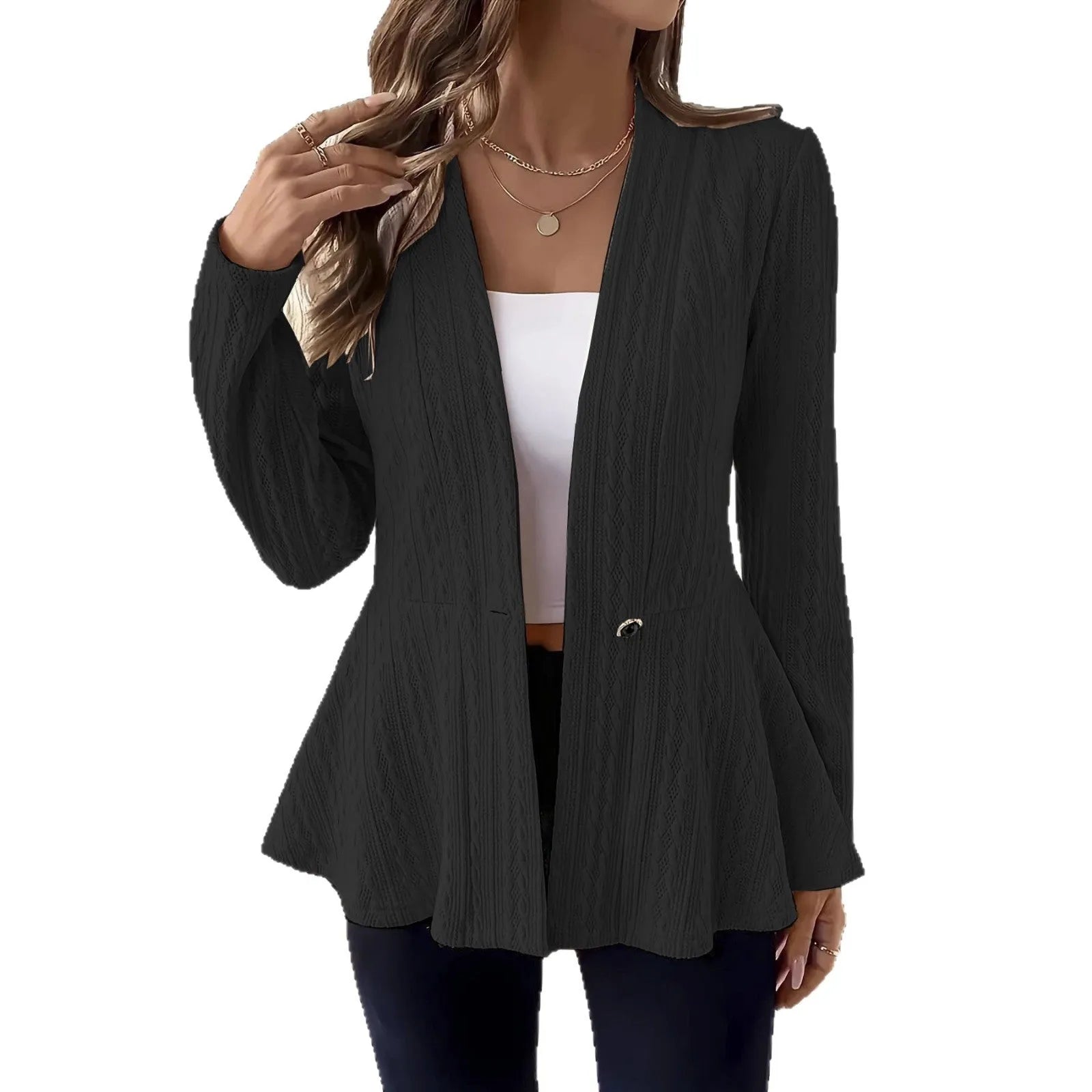 Women's apricot tight-fit Jacquard knitted cardigan with one button on a hanger.