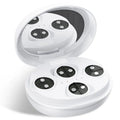 White wireless red light EMS eye and facial massager device on a table