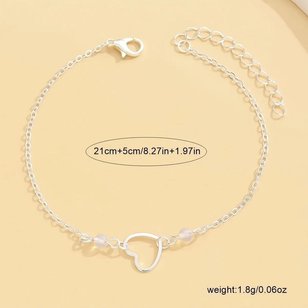 Adjustable women's anklet with heart pendant in gold or silver alloy finish