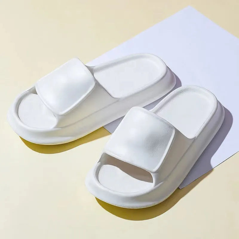 Pair of thickened EVA flip-flop slippers in a chosen colour, showing the non-slip sole and unisex design.