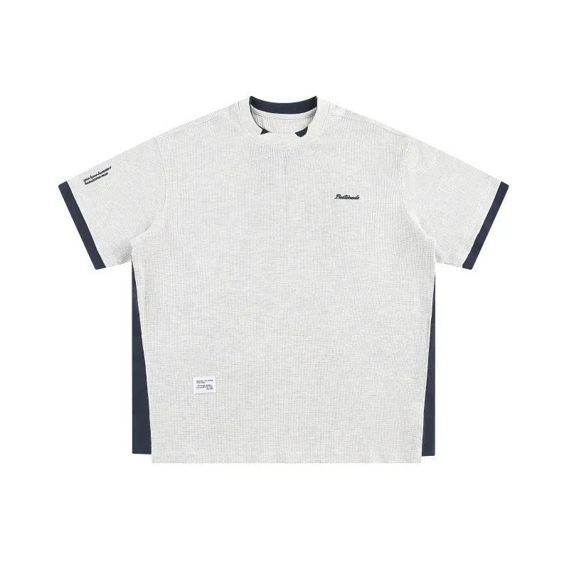 Retro alphabet embroidered loose waffle knit short-sleeved t-shirt in navy blue.