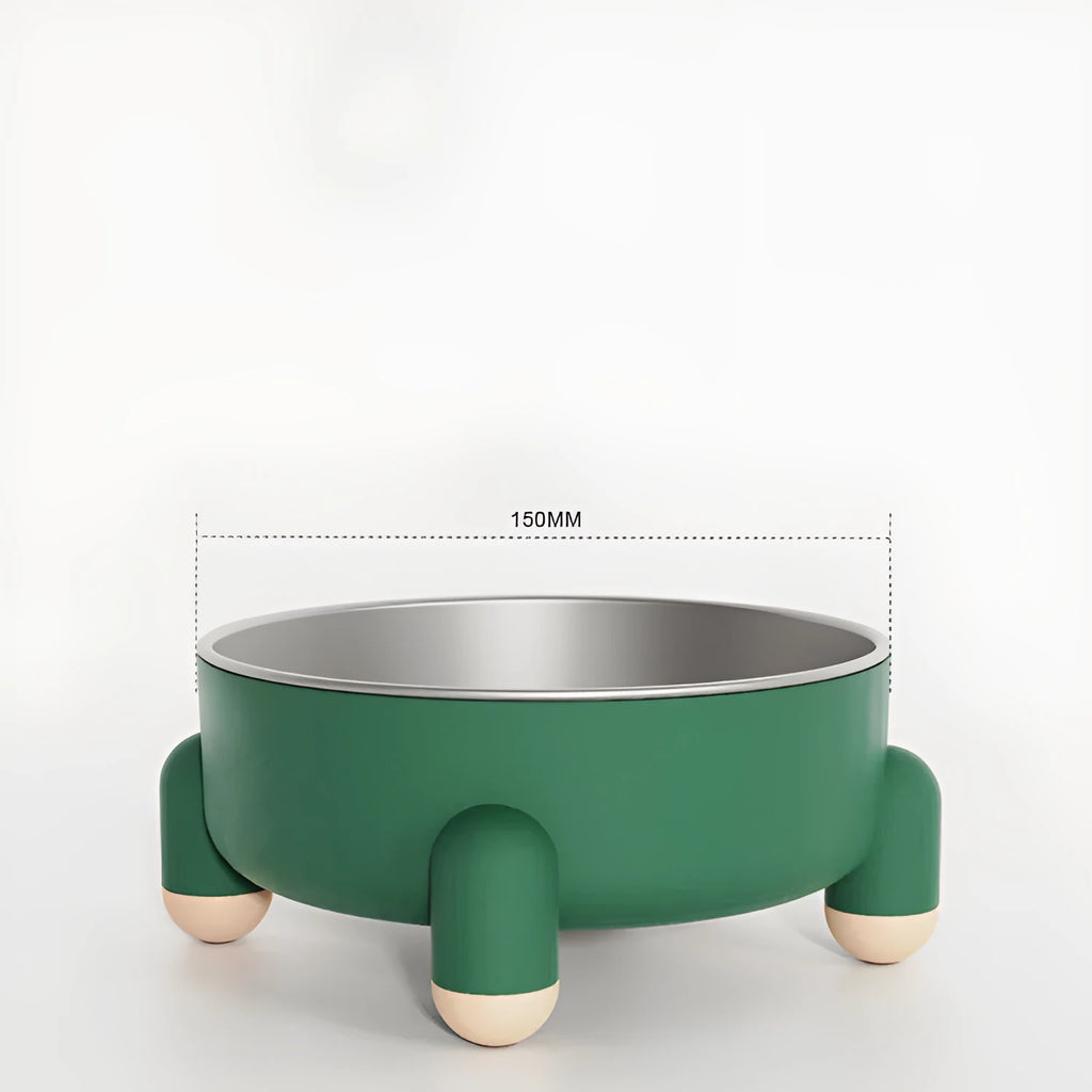 Green stainless steel pet bowl with non-slip base and high foot design on a wooden floor