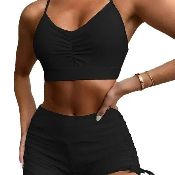 Women's high-waist split bikini swimsuit in black or purple colour with sleeveless design