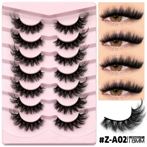 False eyelashes without eyeliner in thick natural long artificial fibre style with adhesive
