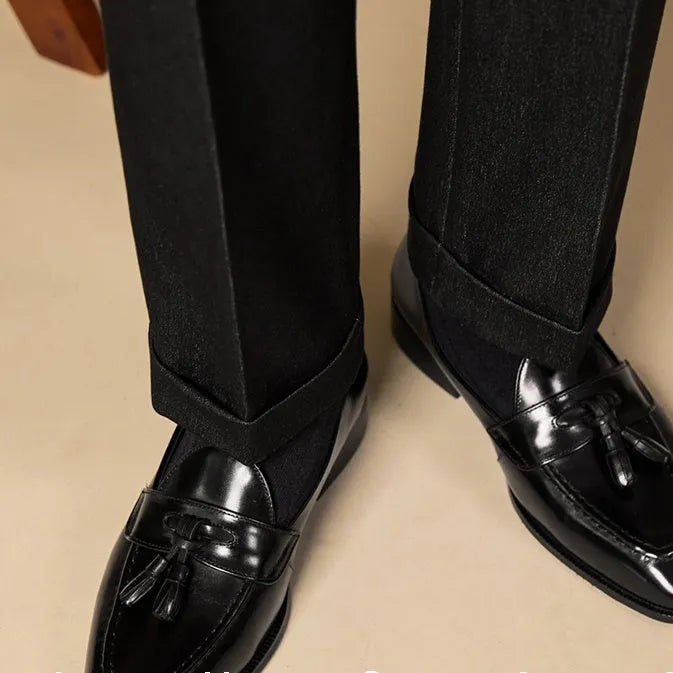 Men's black and brown business casual tassel loafers made from genuine leather with pigskin lining